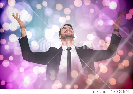 Composite image of businessman cheering with hands raised Composite image of businessman cheering with hands raised 17030676