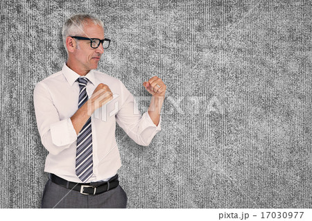 Composite image of boxing businessman 17030977