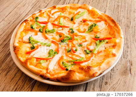 pizza on wooden background 17037266