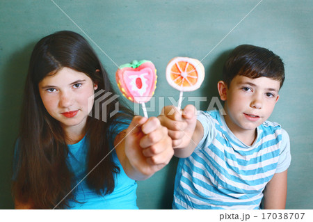 siblings with fruit marsh mellow candies on stick siblings with fruit marsh mellow candies on stick 17038707