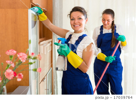 Professional cleaners at work Professional cleaners at work 17039764