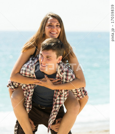 Girl and her boyfriend smiling Girl and her boyfriend smiling 17039839