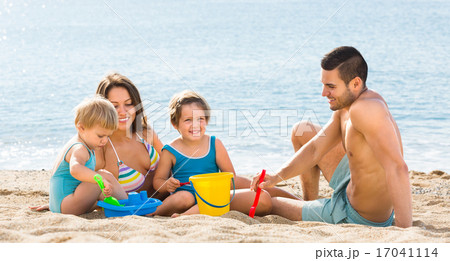 father, mother and two children father, mother and two children 17041114