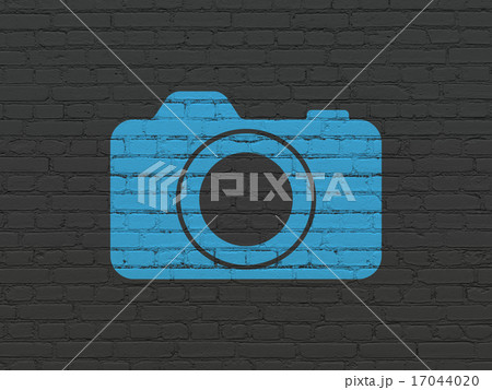 Vacation concept: Photo Camera on wall background 17044020