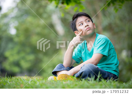 Portrait of a little asian boy in the park Portrait of a little asian boy in the park 17051232