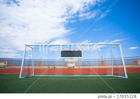 STADIUM - Football field with goal and tablo on blue sky 17055128