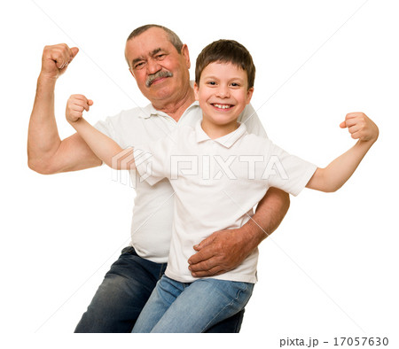 Grandfather and grandchildren show muscle hands Grandfather and grandchildren show muscle hands 17057630