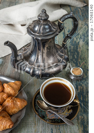 Coffee and croissants Coffee and croissants 17068140