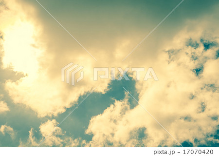 Sun behind white clouds Sun behind white clouds 17070420