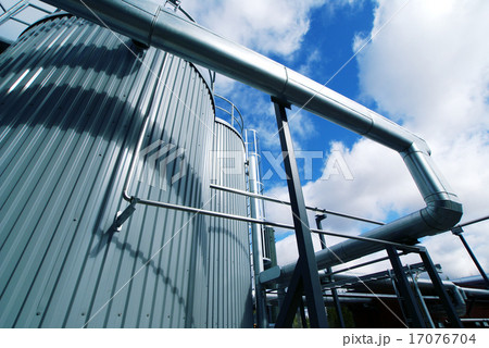 Industrial pipelines and valves against blue sky Industrial pipelines and valves against blue sky 17076704