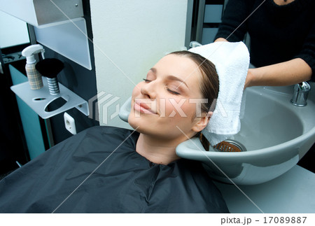 woman drying hair with towel woman drying hair with towel 17089887