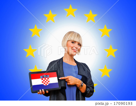 woman holding tablet with croatian flag on european union backg 17090193