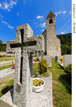 Granite Cross in an Italian Mountain Cemetery 17109604