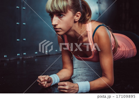 Slim fitness young woman Athlete girl doing plank exercise concept training workout crossfit 17109895