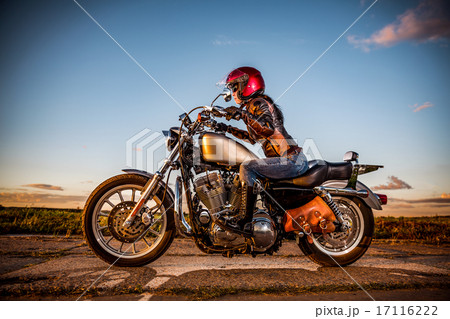 Biker girl on a motorcycle Biker girl on a motorcycle 17116222