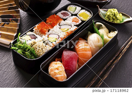 bento box with sushi and rolls 17118962