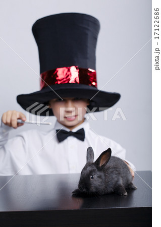 little magician with rabbit studio shot little magician with rabbit studio shot 17122686