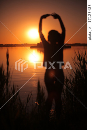 Girl at The Lake Sunset 17123488