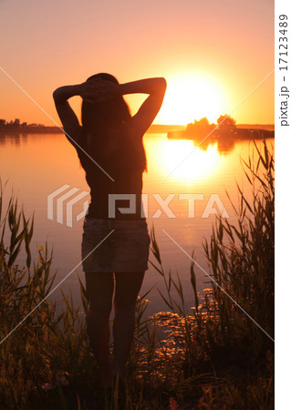 Girl at The Lake Sunset 17123489