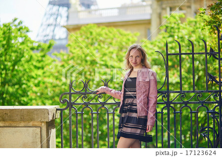 Beautiful young woman on a street near the Eiffel tower 17123624