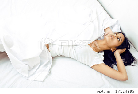 pretty real mulatto brunette woman in bed, cant sleep mad look close up 17124895