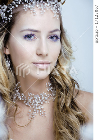 Beautiful young snow queen make up and jewelry ice toned Beautiful young snow queen make up and jewelry ice toned 17125067