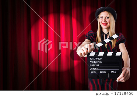 Woman gangster with movie clapper Woman gangster with movie clapper 17129450