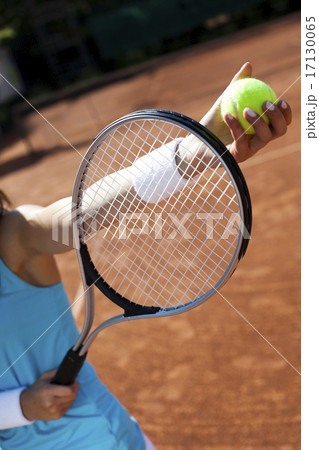 Woman playing tennis in summer Woman playing tennis in summer 17130065