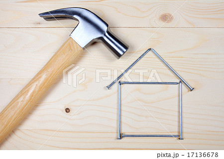 Hammer and nails on wooden background 17136678