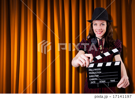 Woman gangster with movie clapper Woman gangster with movie clapper 17141197