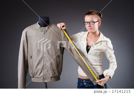Woman tailor working on clothing 17141215