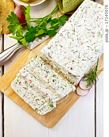 Terrine of curd and radish on paper and board top Terrine of curd and radish on paper and board top 17145076