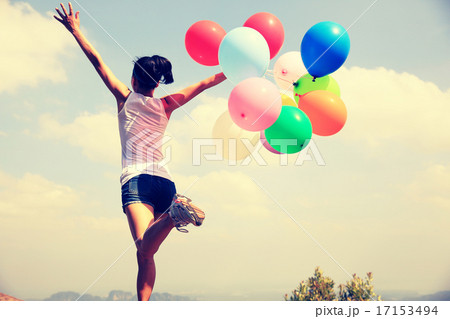 young asian woman running on mountain  17153494