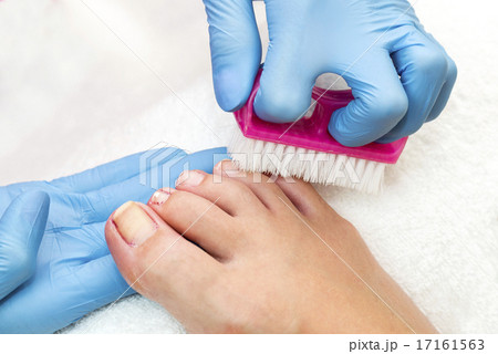 process of pedicure at beauty salon spa 17161563