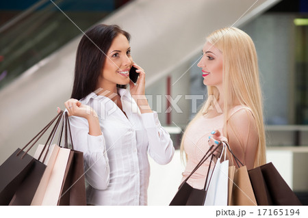 Beautiful young women are going shopping with joy Beautiful young women are going shopping with joy 17165194