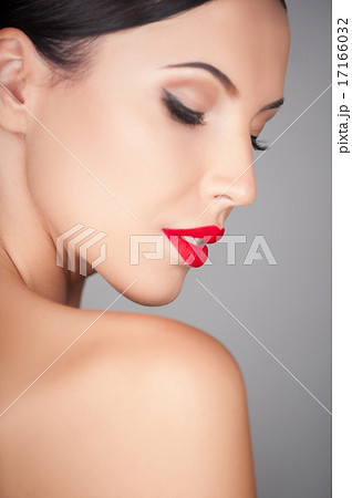 Beautiful young woman is caring of her skin Beautiful young woman is caring of her skin 17166032