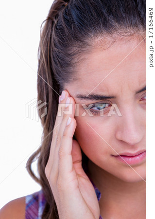 A pretty brunette with headache 17166469