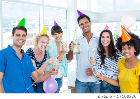 Business people toasting with glasses of champagne 17168826