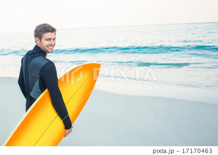 Man in wetsuit with a surfboard on a sunny day Man in wetsuit with a surfboard on a sunny day 17170463