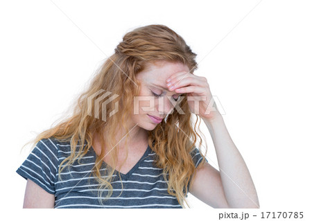 A blonde woman having headache 17170785
