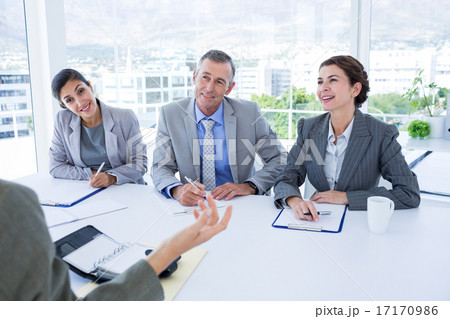 Interview panel listening to applicant Interview panel listening to applicant 17170986