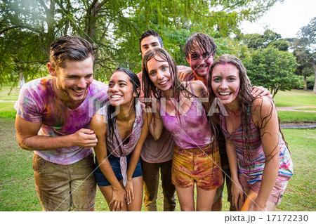 Happy friends covered in powder paint Happy friends covered in powder paint 17172230