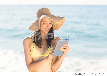 pretty woman playing on tablet pretty woman playing on tablet 17173453