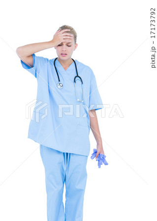 blond female doctor being depressed 17173792