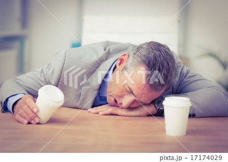 Businessman sleeping Businessman sleeping 17174029