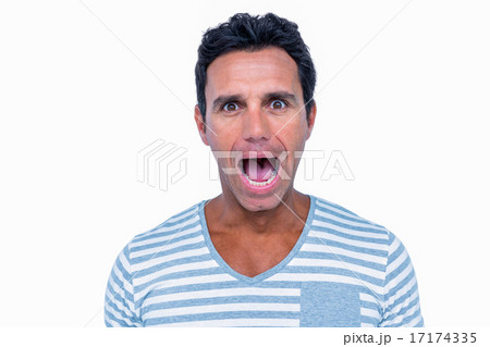 Shocked man looking at camera Shocked man looking at camera 17174335