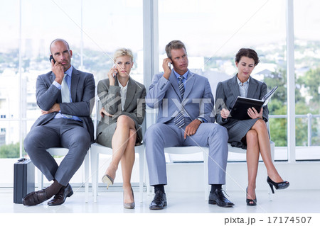 Business people waiting to be called into interview Business people waiting to be called into interview 17174507