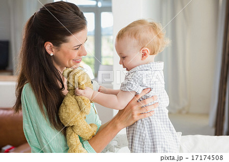 Happy mother with her baby boy Happy mother with her baby boy 17174508