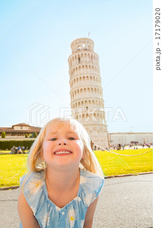 Portrait of happy baby girl in front of leaning tower of pisa, t Portrait of happy baby girl in front of leaning tower of pisa, t 17179020