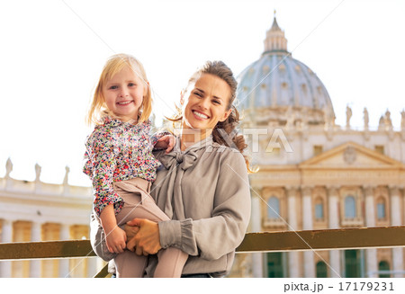 Portrait of happy mother and baby girl on piazza san pietro in v Portrait of happy mother and baby girl on piazza san pietro in v 17179231